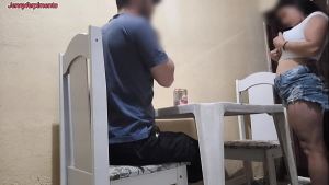 Young couple having sex in a bar in public