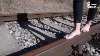 Barefoot walking and dirty feet on rails (long toes, bare feet, foot tease, sexy feet, public feet)