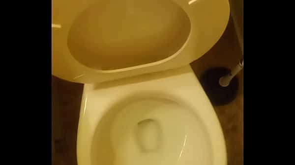 21 year old taking a piss in the toilet with a bit of penis showing