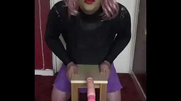 bisexual crossdressing sissy loves pussy as you can tell as this vibrating dildo rides his ass