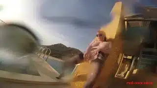 Sexy mature Red XXX masturbates outside by the pool